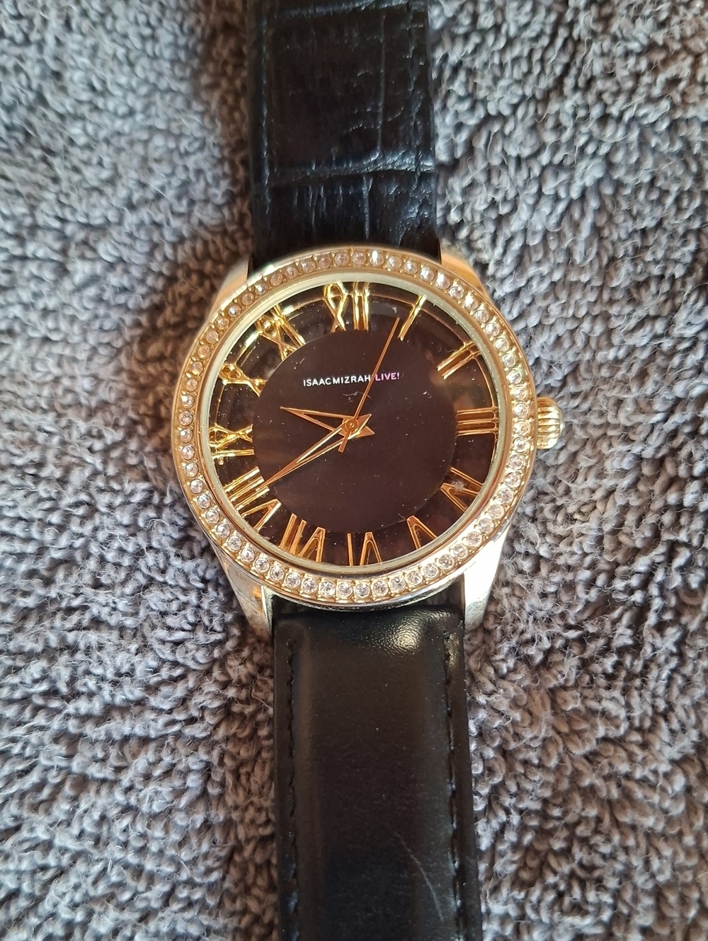 Isaac Mizrahi Women's Black Dial Watch with Gold Accents and Crystal Bezel